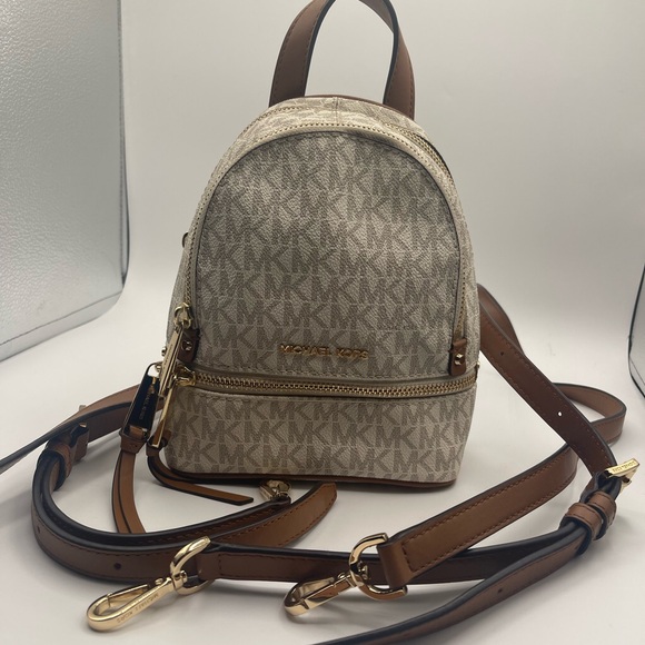 Michael Kors Mini Rhea Cream and Tan Backpack -like new (04) - Picture 9 of 12